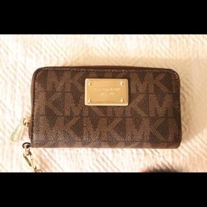 Authentic Michael Kors wallet with wrist strap
